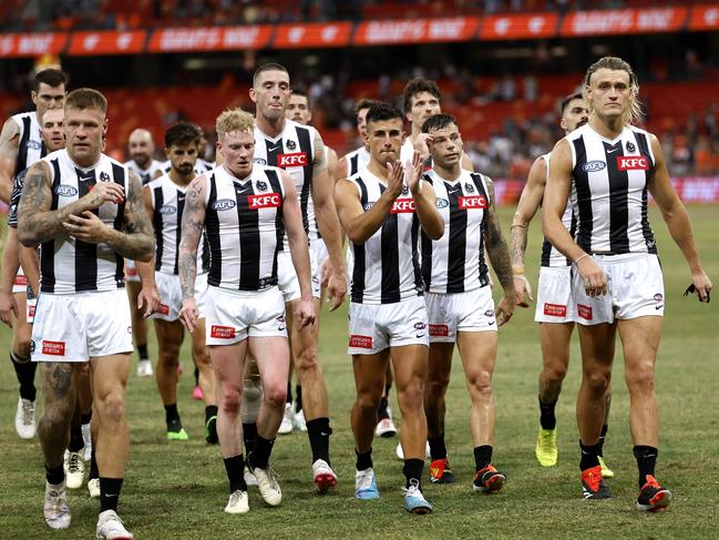 Collingwood's Nick Daicos and Darcy Moore leave the field during the AFL Opening Round match between the GWS Giants and Collingwood Magpies at Engie Stadium, Sydney on  March 9, 2024.  Photo by Phil Hillyard(Image Supplied for Editorial Use only - Phil Hillyard  **NO ON SALES** - Â©Phil Hillyard )