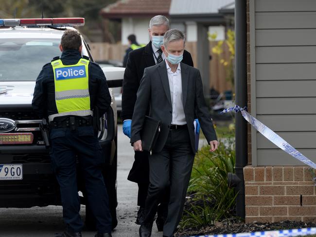Police at the house on Tuesday. Picture: Andrew Henshaw