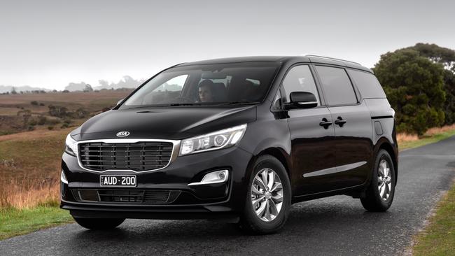 The Kia Carnival is the closest you can get to the load capacity of a school bus.