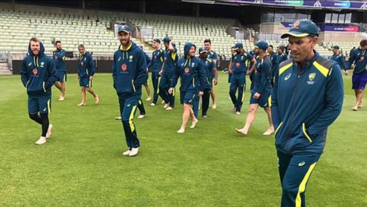 Australia's cricketers take part in a barefoot session ahead of their semi final.