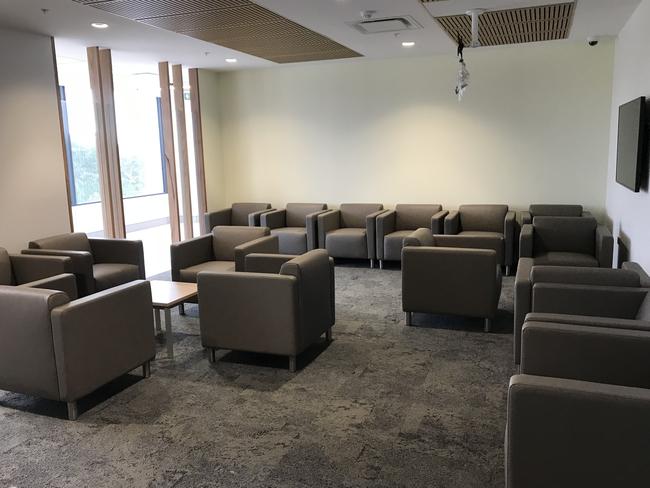 Staff only realised when water started streaming down walls, out of vents and electrical fittings in the floors below such as this new waiting area.