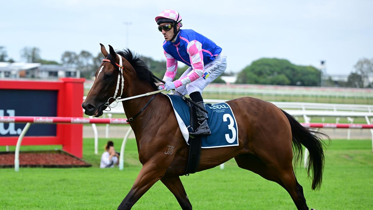 Jockey Andrew Mallyon wears a “morale patch” from Ukraine on his riding breeches to win the Listed Keith Noud on Bubba’s Bay at Doomben. Picture: Grant Peters/Trackside Photography