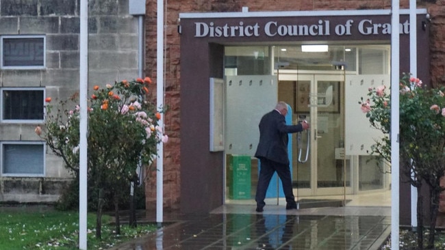 Grant Mayor Richard Sage walking into the council meeting ahead of his a public apology after the SA Ombudsman found he committed misconduct. Picture: Jessica Ball