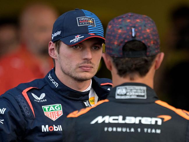 Red Bull Racing's Dutch driver Max Verstappen (L) talks with McLaren's British driver Lando Norris after the qualifying session of the Formula One Mexico City Grand Prix at the Hermanos Rodriguez racetrack, in Mexico City on October 26, 2024. (Photo by Alfredo ESTRELLA / AFP)