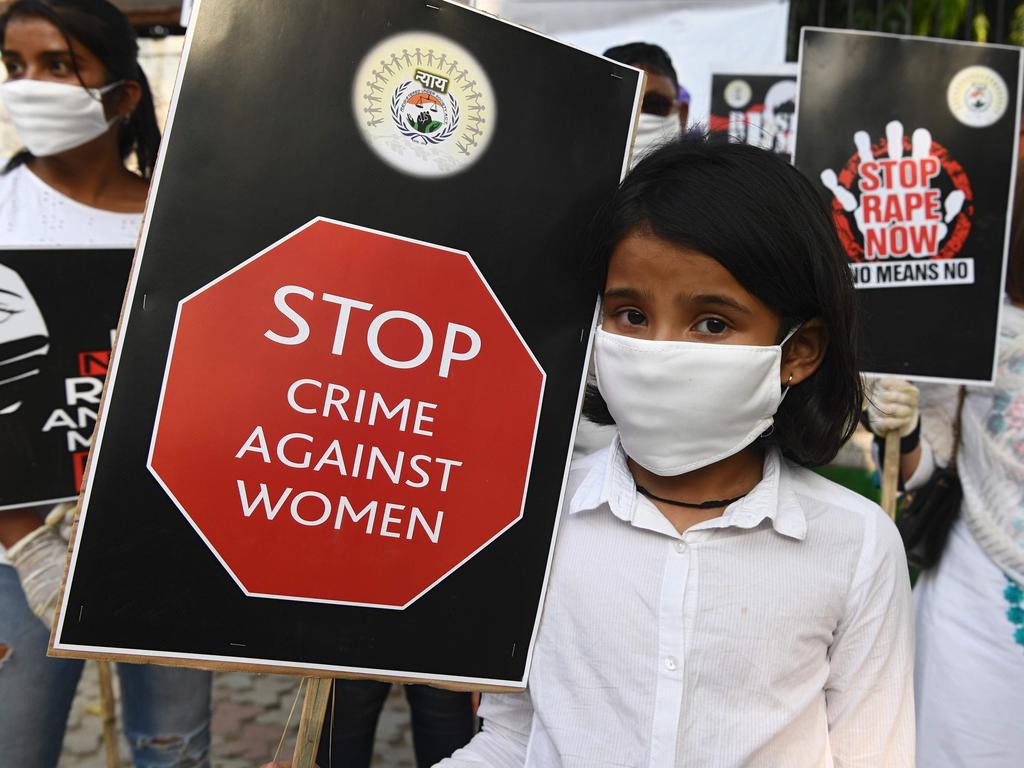 Volunteers hold placards during a protest in New Delhi to condemn the alleged gang-rape and murder of a teenage woman in Bool Garhi village at Hathras in Uttar Pradesh state. Picture: AFP