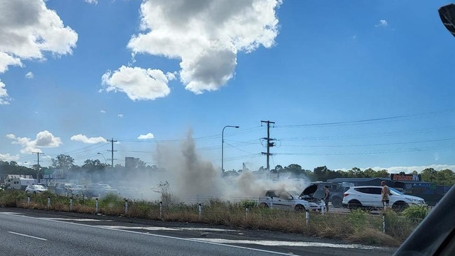 Major delays are occurring on the Pacific Motorway after a car went up in flames near Burpengary. Picture: Antoinette Price