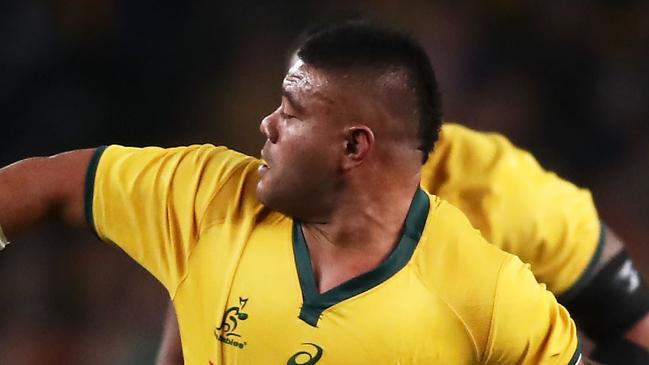 SYDNEY, AUSTRALIA - JUNE 23:  Tolu Latu of the Wallabies offloads the ball in a tackle during the Third International Test match between the Australian Wallabies and Ireland at Allianz Stadium on June 23, 2018 in Sydney, Australia.  (Photo by Matt King/Getty Images)