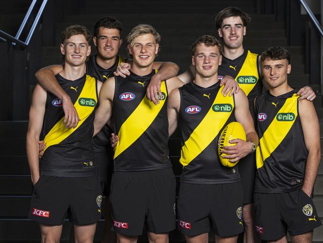 MELBOURNE, AUSTRALIA - NOVEMBER 21: Richmond draftees (L-R) Luke Trainor, Harry Armstrong, Josh Smillie, Sam Lalor, Jonty Faull and Taj Hotton pose for a photograph during the 2024 AFL Draft at Marvel Stadium on November 21, 2024 in Melbourne, Australia. (Photo by Daniel Pockett/AFL Photos via Getty Images)