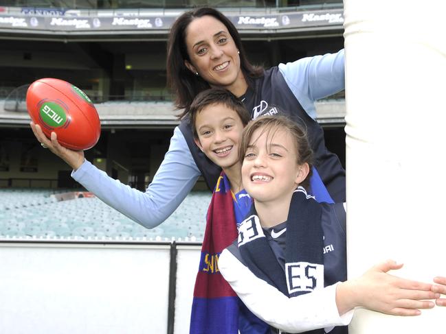 Nicole Livingstone with daughter Ella and son Josh at the MCG.