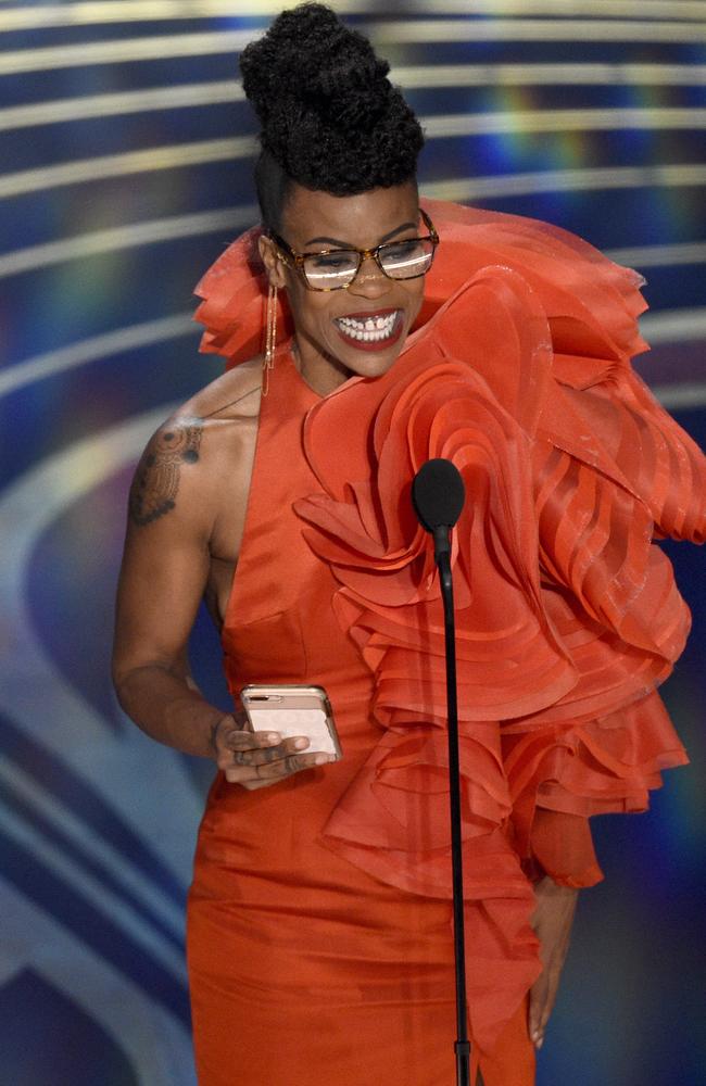 Hannah Beachler was also the first black woman to win for Best Production Design, and adorably read her speech from her phone. Picture: Chris Pizzello/Invision/AP