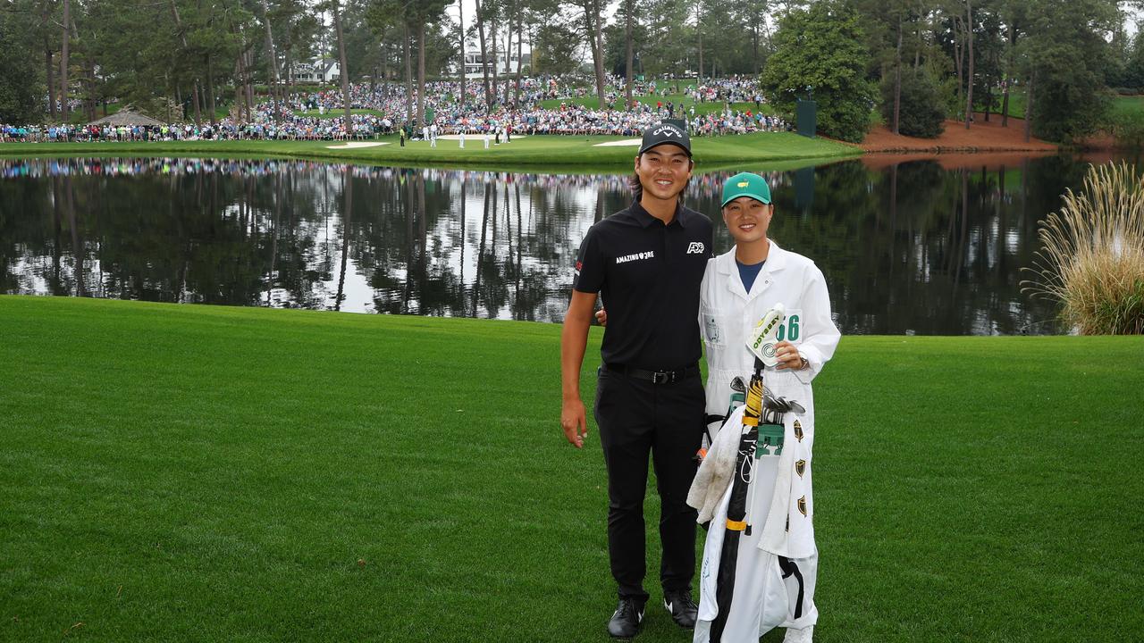 Min Woo Lee and sister Minjee during the Par Three Contest prior to the Masters (Photo by Andrew Redington/Getty Images)
