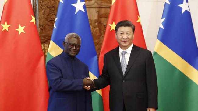 Chinese President Xi Jinping (R) shakes hands with Prime Minister Manasseh Damukana Sogavare of the Solomon Island in 2019. Picture: Getty Images