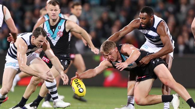 Geelong won some key contests at stoppages against the Power. Picture: Sarah Reed/AFL Photos