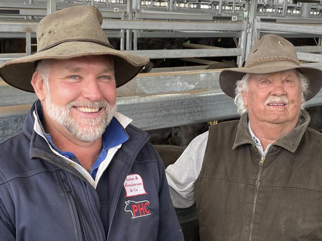 Simon Henderson from Phelan and Henderson Co agency bought a large line of 40 Angus heifers at $2400 for his client at Phillip Island. He is pictured with friend Brian Cantwell, right.