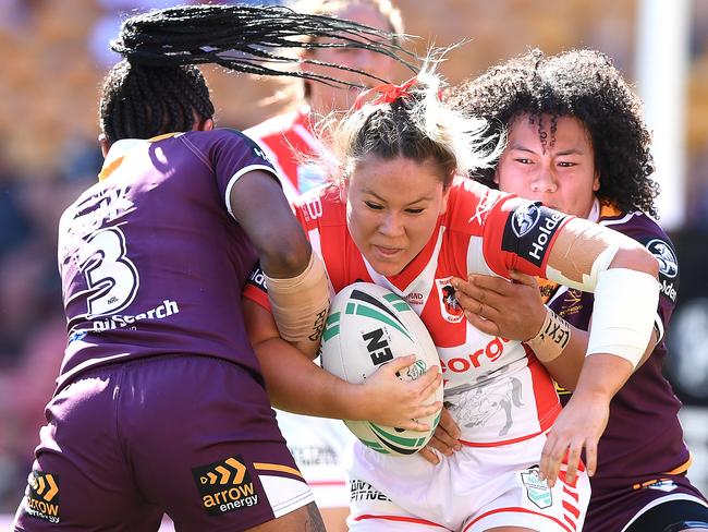 Keeley Davis is tackled during the NRL Women's Premiership match between the Brisbane Broncos and the St George-Illawarra Dragons.