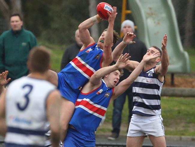 Ex-Shark Daniel Cooper takes a mark against his former club. Picture: Stuart Milligan