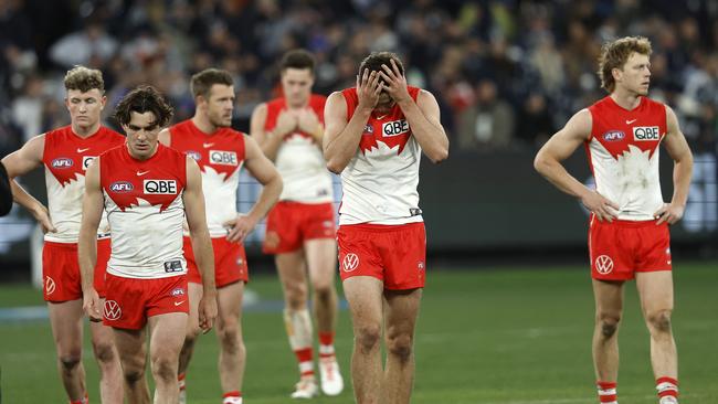 Errol Gulden and Logan McDonald leave the field after the Swans narrow loss during the AFL Elimination Final between Carlton and the Sydney Swans at the MCG on September 8, 2023. Photo by Phil Hillyard (Image Supplied for Editorial Use only – **NO ON SALES** – Â©Phil Hillyard )