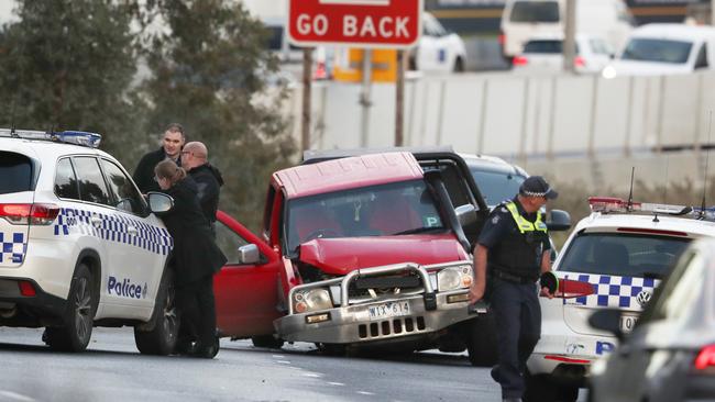 The ute remains close to the the Edgars Rd off-ramp in Thomastown. Picture: David Crosling