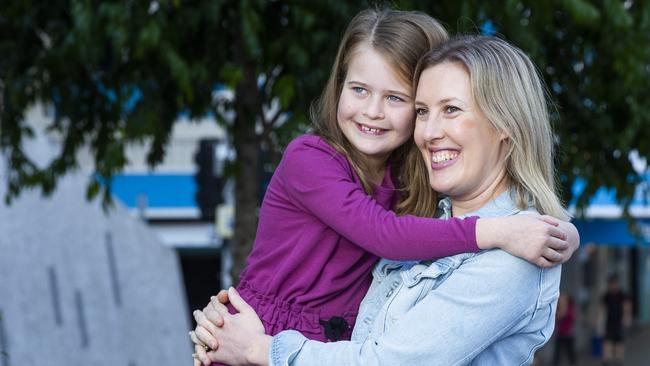 Malia Knox with her mum Kelley Knox in King George Square. Picture: AAP/Renae Droop