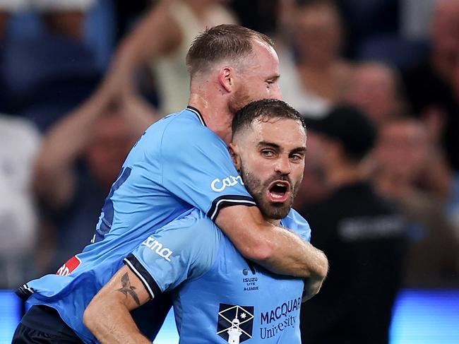 SYDNEY, AUSTRALIA - FEBRUARY 08: Anthony Caceres of Sydney celebrates scoring a goal during the round 18 A-League Men match between Sydney FC and Western Sydney Wanderers at Allianz Stadium, on February 08, 2025, in Sydney, Australia. (Photo by Brendon Thorne/Getty Images)