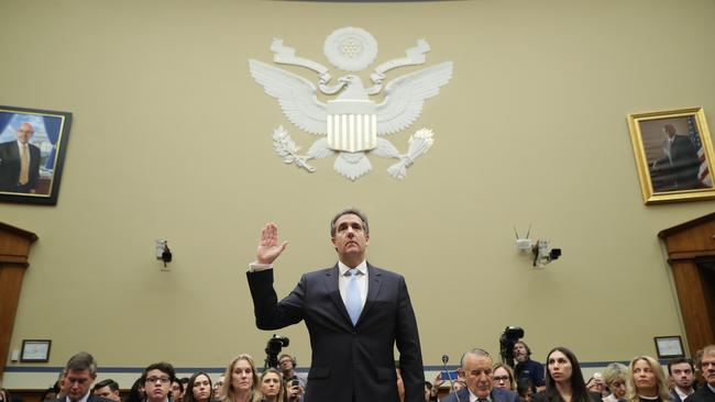 WASHINGTON, DC - FEBRUARY 27: Michael Cohen, former attorney and fixer for President Donald Trump is sworn in before testifying before the House Oversight Committee on Capitol Hill February 27, 2019 in Washington, DC. Last year Cohen was sentenced to three years in prison and ordered to pay a $50,000 fine for tax evasion, making false statements to a financial institution, unlawful excessive campaign contributions and lying to Congress as part of special counsel Robert Mueller's investigation into Russian meddling in the 2016 presidential elections. (Photo by Chip Somodevilla/Getty Images)