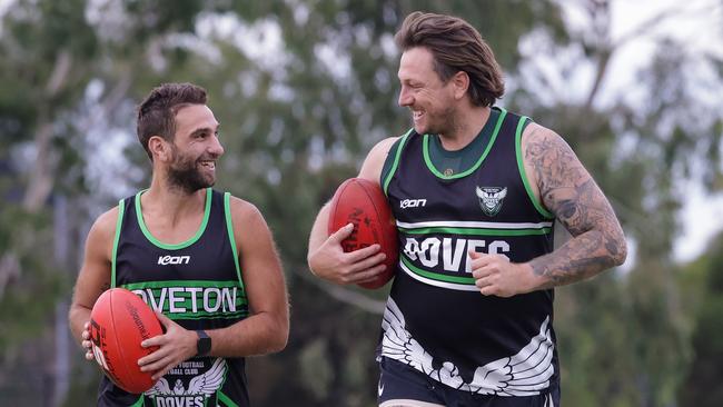 Coach Michael Cardamone (left) and Pattinson go for a jog. Picture: Ian Currie