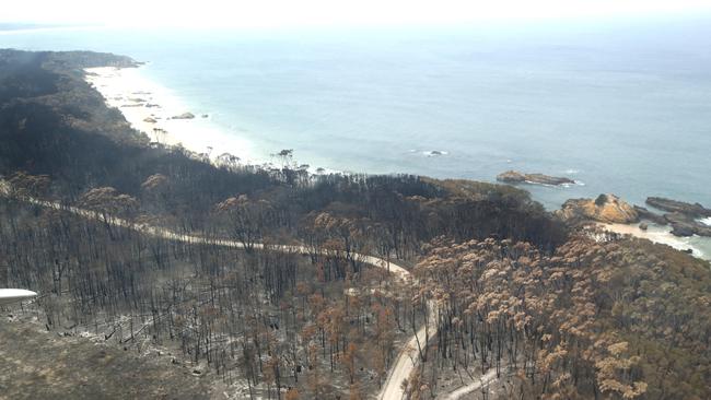 An aerial shot of the burnt coastline at Mallacoota. Picture: David Caird