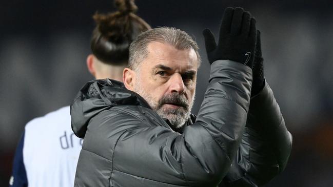 GLASGOW, SCOTLAND - DECEMBER 12: Ange Postecoglou, Manager of Tottenham Hotspur, applauds the fans after the draw during the UEFA Europa League 2024/25 League Phase MD6 match between Rangers FC and Tottenham Hotspur at Ibrox Stadium on December 12, 2024 in Glasgow, Scotland. (Photo by Stu Forster/Getty Images)