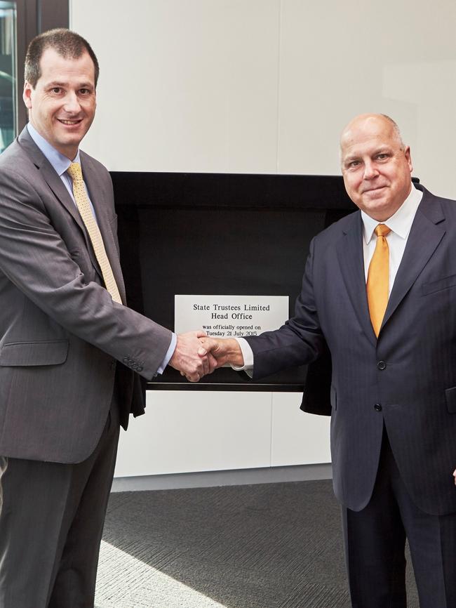 State Trustees chief executive Craig Dent with Victorian Treasurer Tim Pallas.