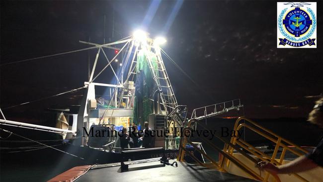 VMR assisting a fishing trawler which activated an emergency beacon off Fraser Island on Monday morning. Photo: Marine Rescue Hervey Bay.