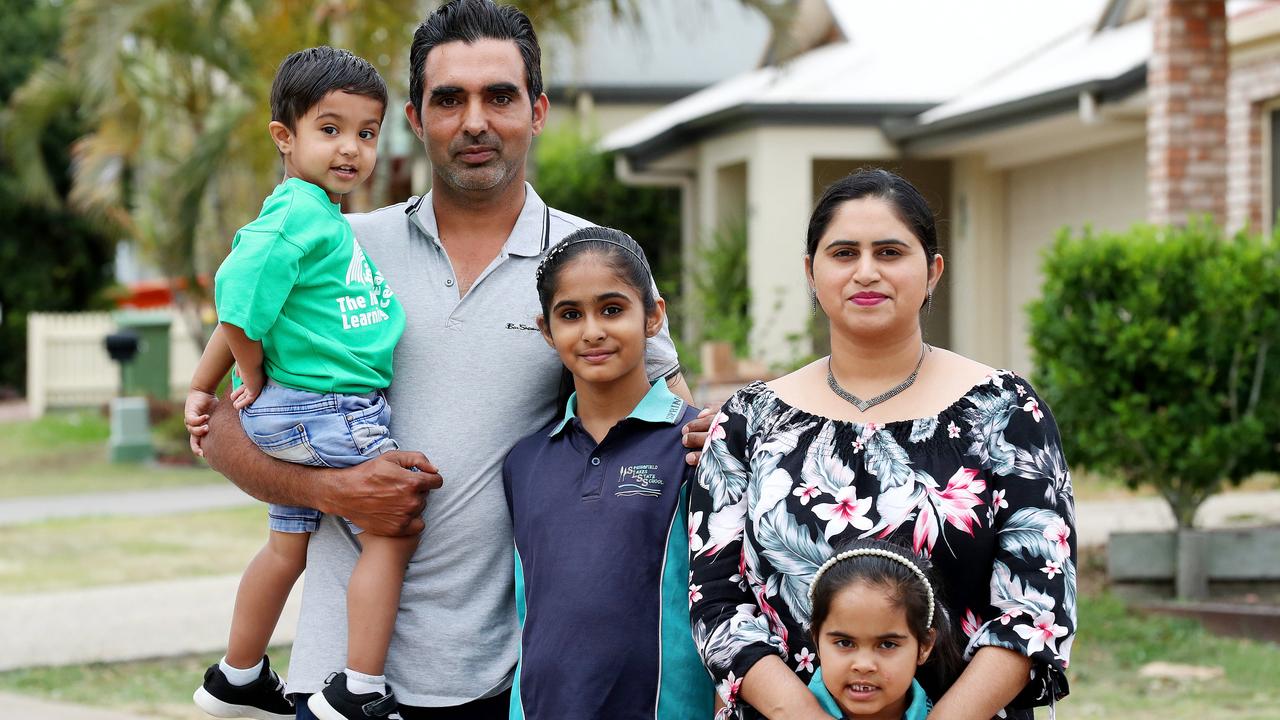 Ramandip Singh and Mandeep Kaur with their three kids Ravneet, 10, Japneet, 5, and Ajeet, 2, at Springfield Lakes, Springfield in 2020. Photographer: Liam Kidston