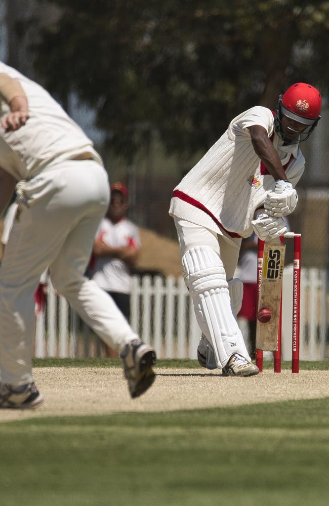 Ashley Chandrasinghe drives during his century. Pic: Chris Thomas.