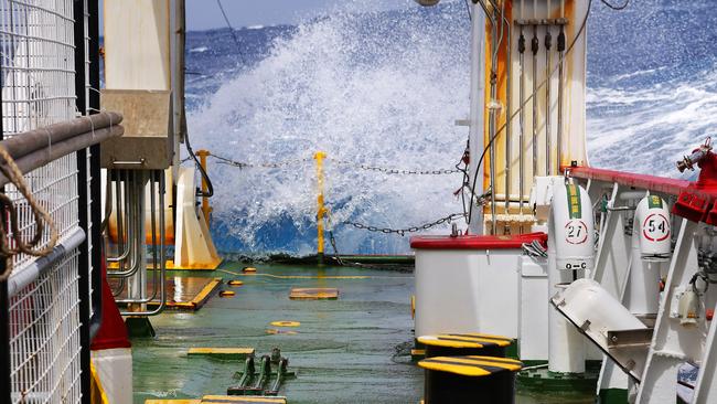 Waves crash over the back deck of Fugro discover as she continues in the search for the missing Malaysia Airlines flight MH370. *** Local Caption *** Fugro Discover continues the seabed search for the missing Malaysia Airlines flight MH370 in the Southern Indian Ocean.