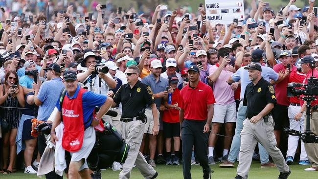 Few can attract a crowd quite like Tiger Woods on a Sunday. Pic: Getty Images/AFP