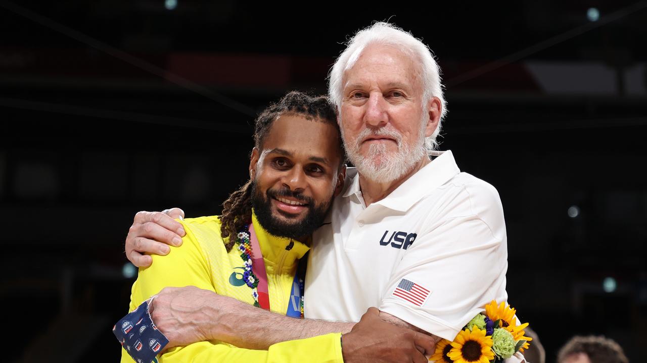USA and San Antonio Spurs coach Gregg Popovich with Patty Mills after the Tokyo Olympics medal ceremony.