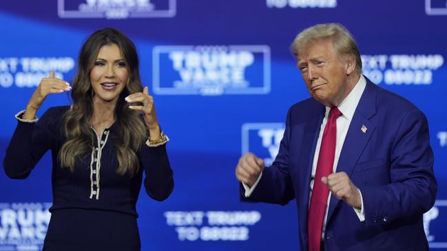 South Dakota Governor Kristi Noem and Donald Trump dance to YMCA at a campaign town hall in Oaks, Pennsylvania. Picture: AP