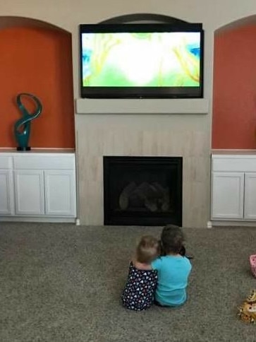 Bella and Celeste watching television in the house. Picture: Facebook