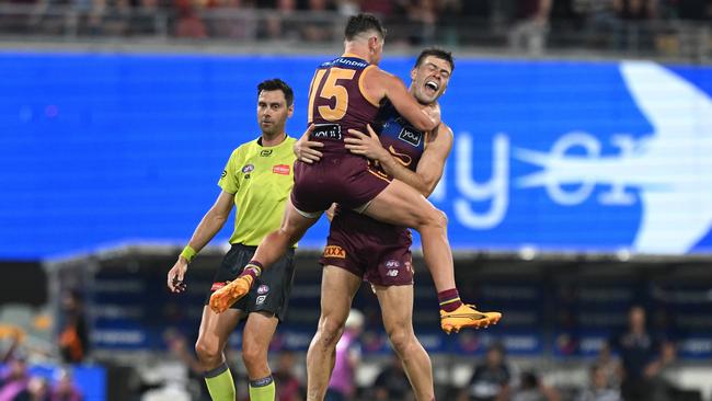Dayne Zorko (15) and Josh Dunkley celebrate after Brisbane’s win over Geelong. Picture: Bradley Kanaris/Getty Images