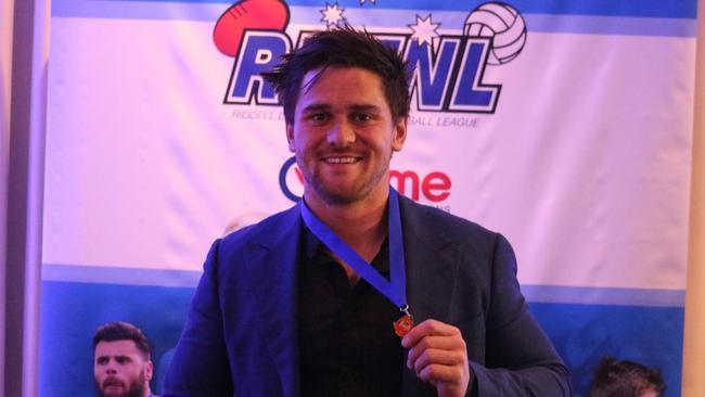 Wallan’s Jesse Davies shows off his Bowen Medal.