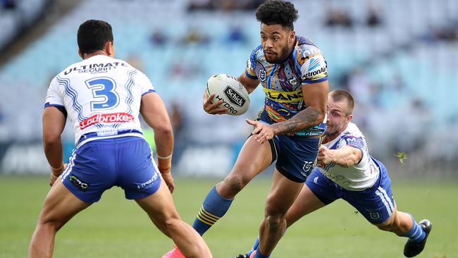 Eels centre Waqa Blake is rounded up by the Bulldogs defence Picture: Getty Images