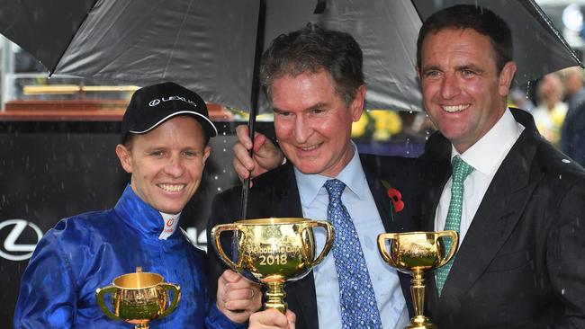 The winning connection ... jockey Kerrin McEvoy (L), Godolphin chief executive Hugh Anderson (C) and trainer Charlie Appleby. Picture: AFP