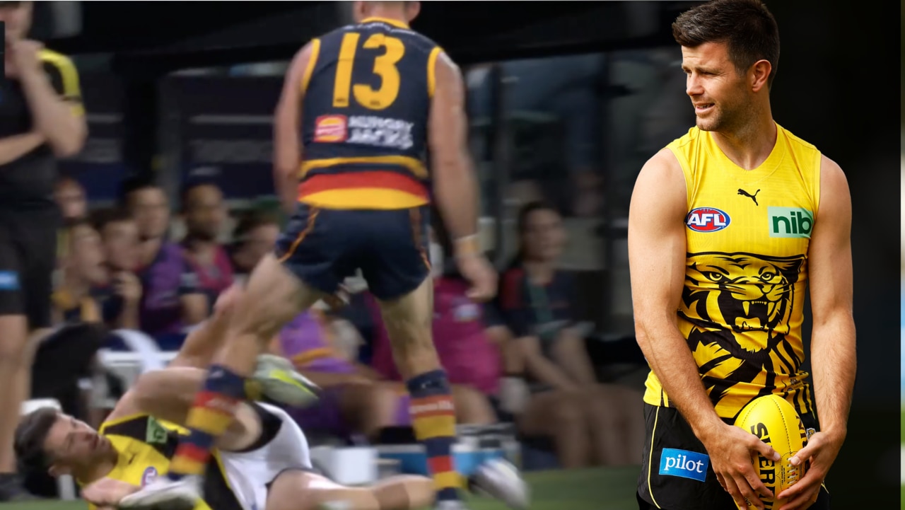 Trent Cotchin says he was 'protecting' himself when he lashed out at Taylor Walker with his leg.