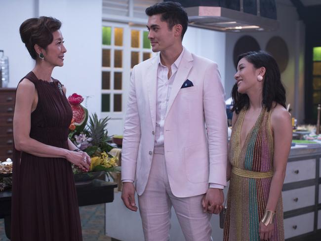 Michelle Yeoh, Henry Golding and Constance Wu in a scene from Crazy Rich Asians. Picture: Sanja Bucko/Warner Bros