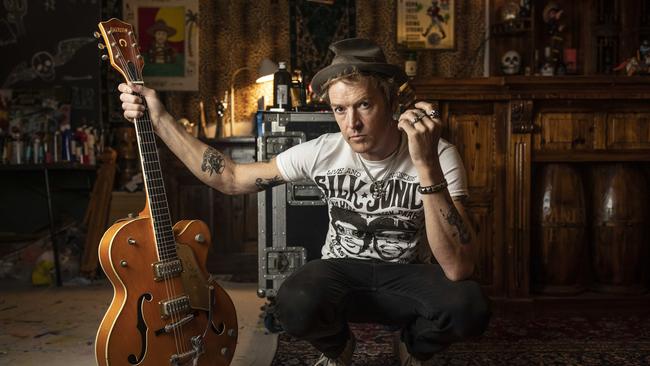 The Living End frontman and guitarist Chris Cheney at his home studio in Melbourne. His debut solo album ‘The Storm Before The Calm’ was released in June 2022. Picture: Arsineh Houspian