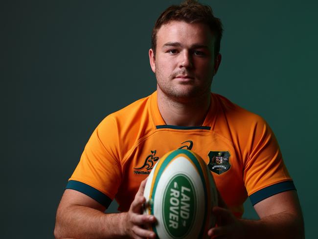 SUNSHINE COAST, AUSTRALIA - JUNE 24:  Harry Wilson poses during the Australian Wallabies 2022 team headshots session on June 24, 2022 in Sunshine Coast, Australia. (Photo by Chris Hyde/Getty Images for Rugby Australia)