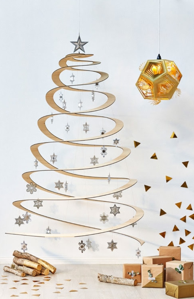 Industrial designer Zev Bianchi has invented a Christmas tree that collapses into a flatpack 