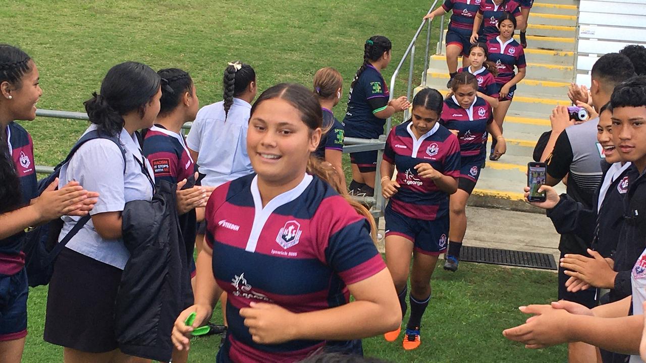 Ipswich SHS players take to the field.