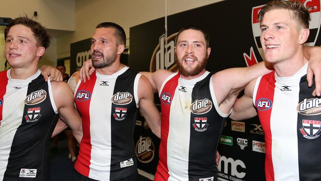 St Kilda players celebrate Sunday’s win. Picture: George Salpigtidis