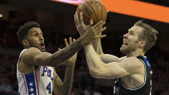 Jonah Bolden comes to grips with Melbourne’s David Barlow. Picture: AFP.