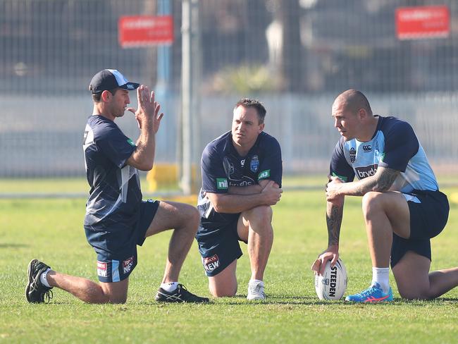 Coaching staff Danny Buderus and Luke Phillips with David Klemmer. Picture: Brett Costello